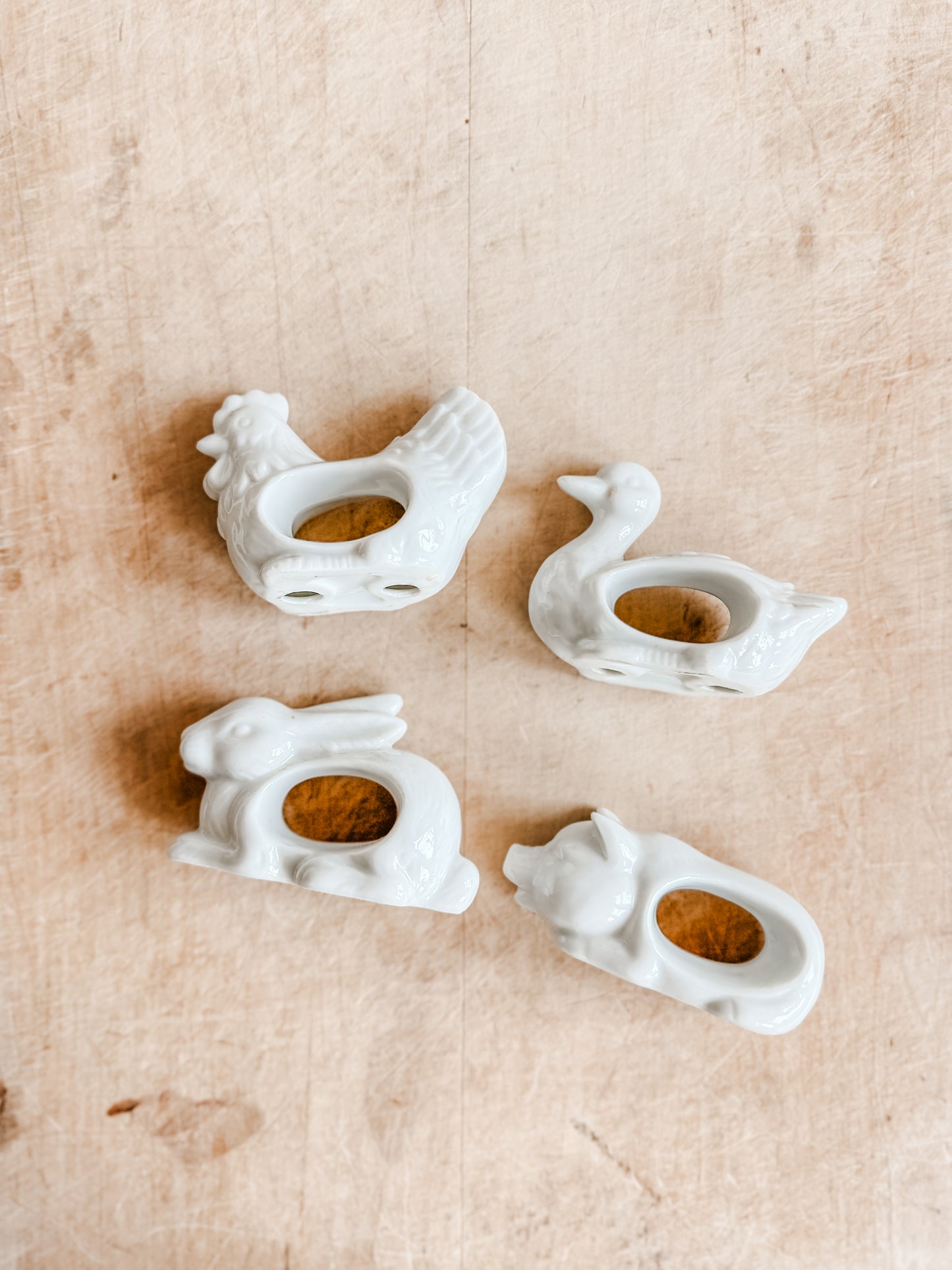 Four White Porcelain Farm Animal Napkin Rings