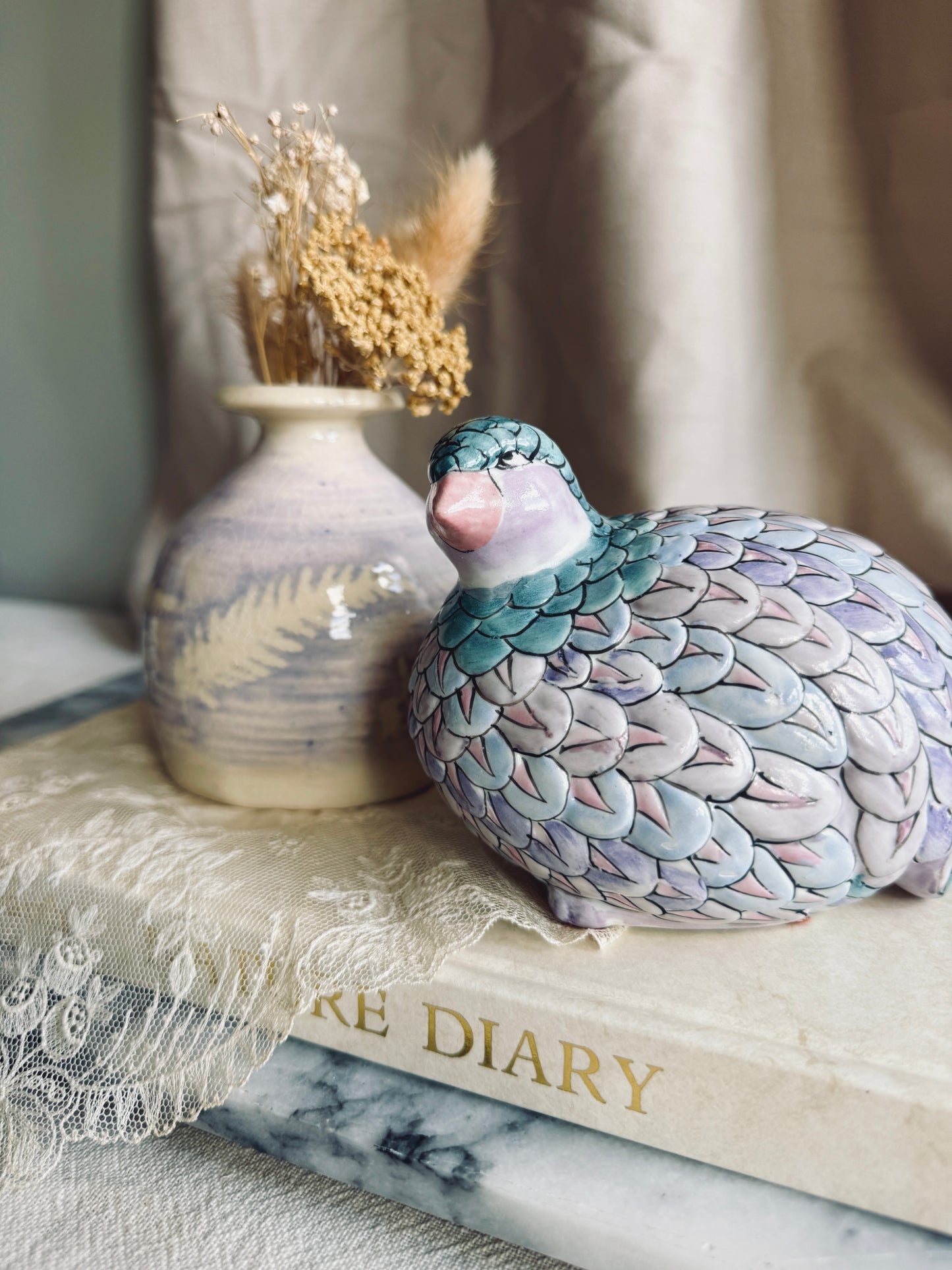 Colorful ceramic quail