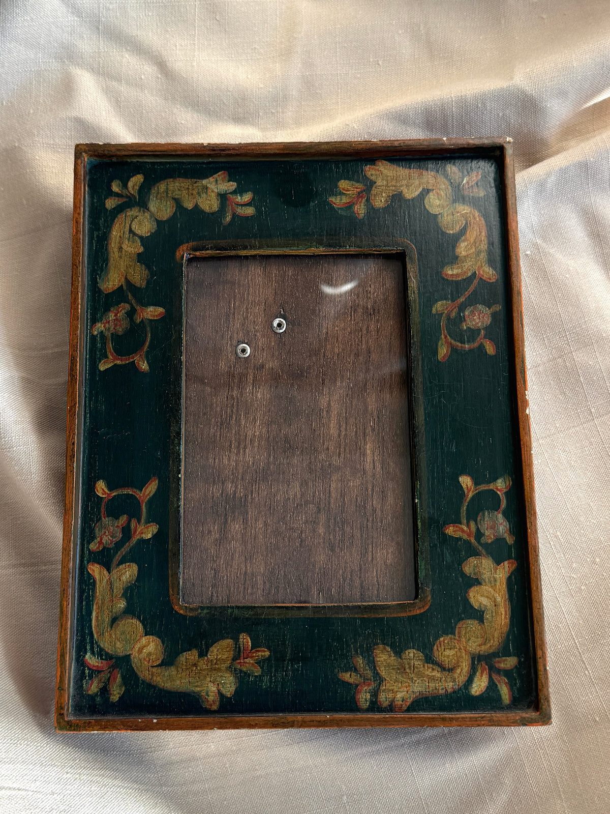 Handmade wooden frame with painted details