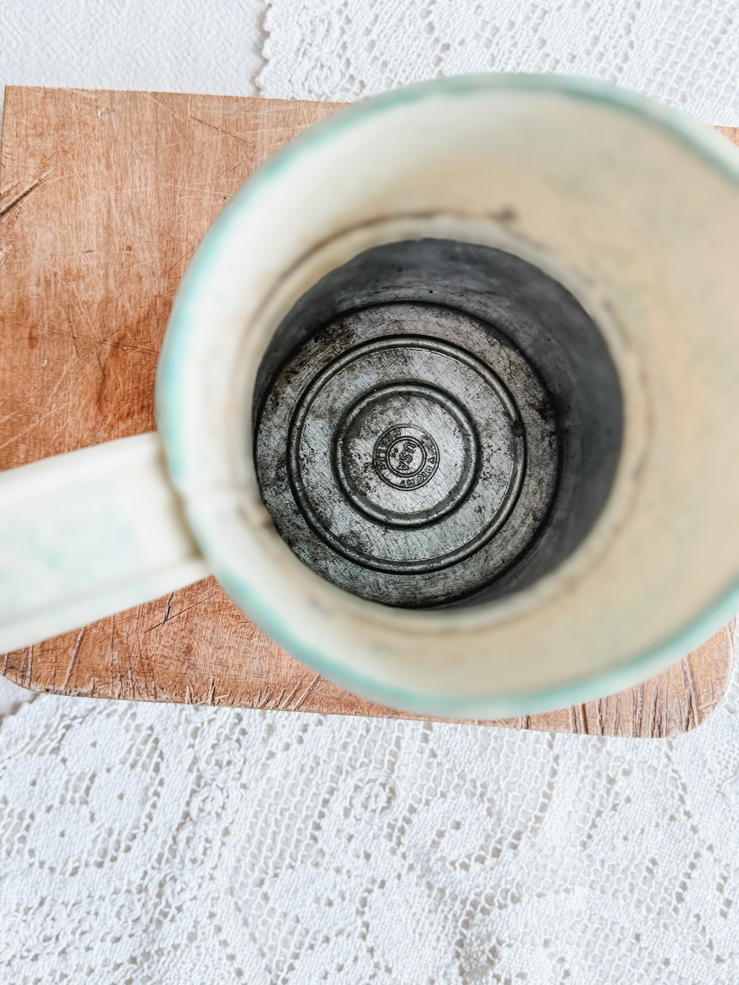 Handpainted green and yellow pitcher