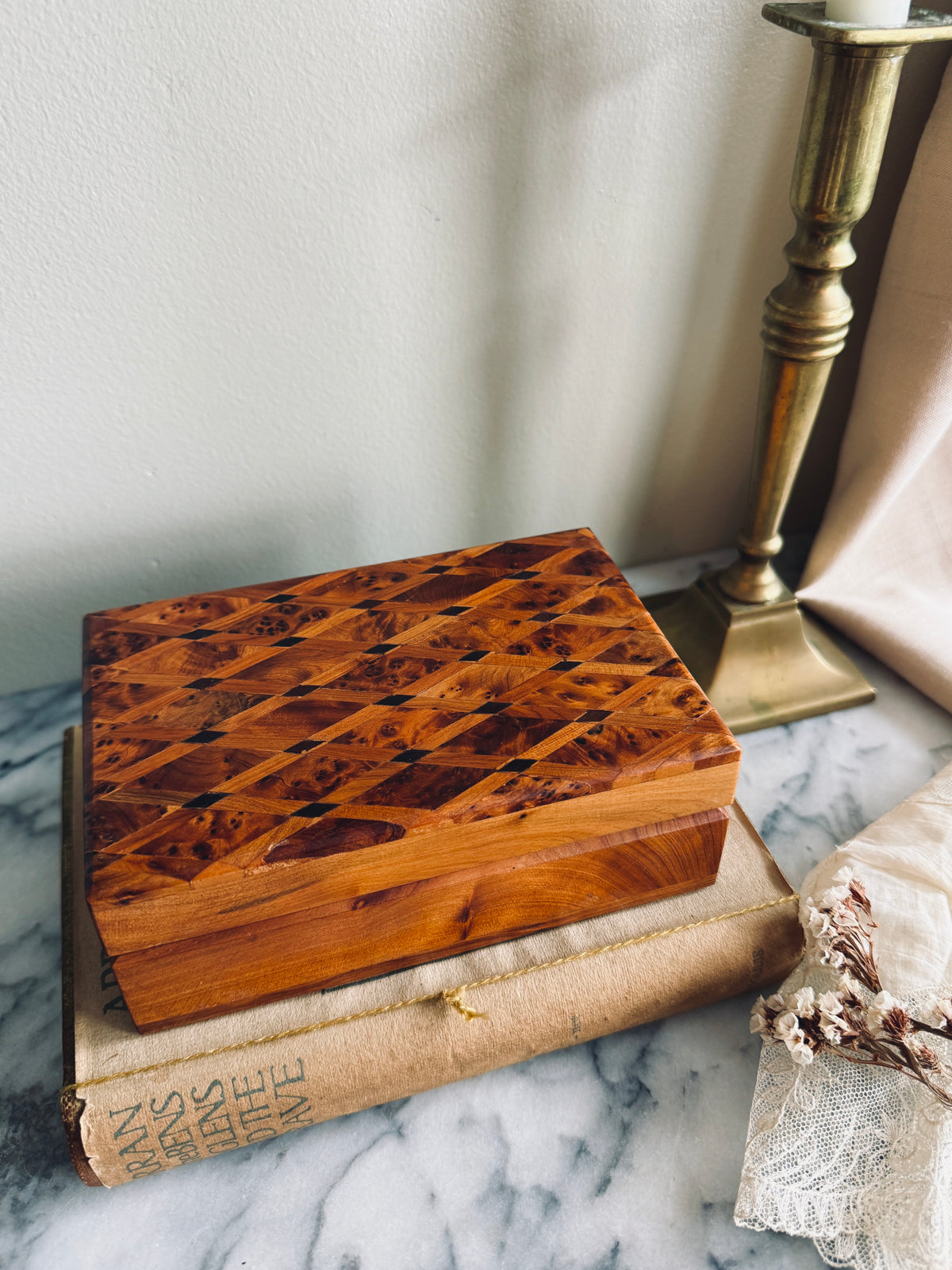 Handcrafted wooden burl wood box with intricate inlay lid