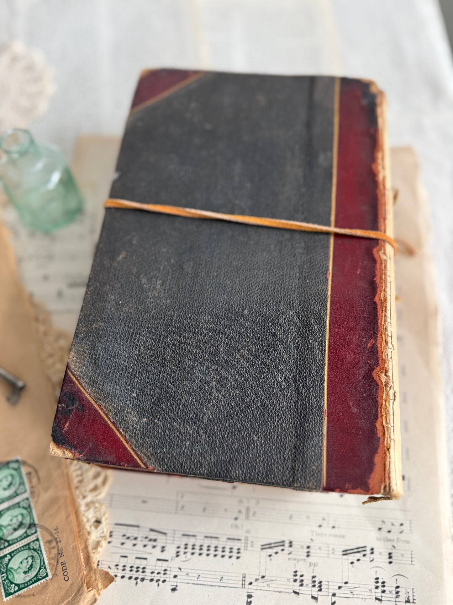 Antique book set with leather tie