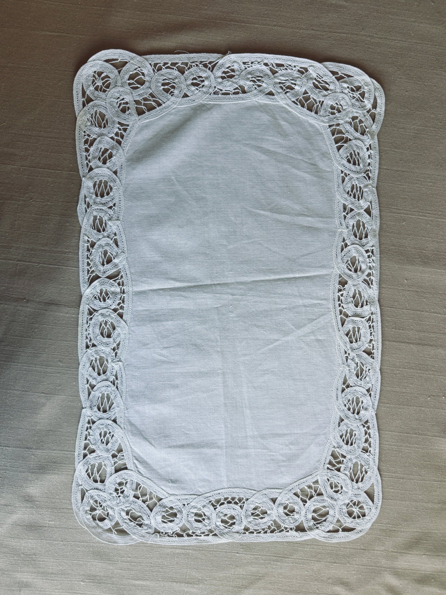 White vintage linen with lace border