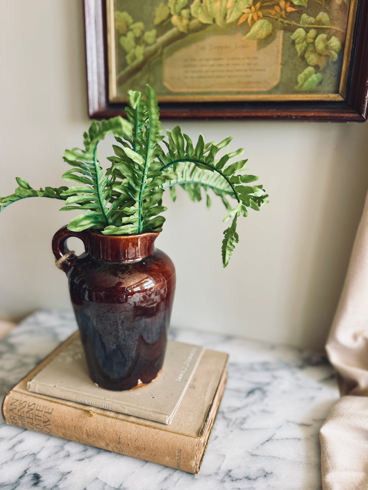 Brown glazed crock pitcher