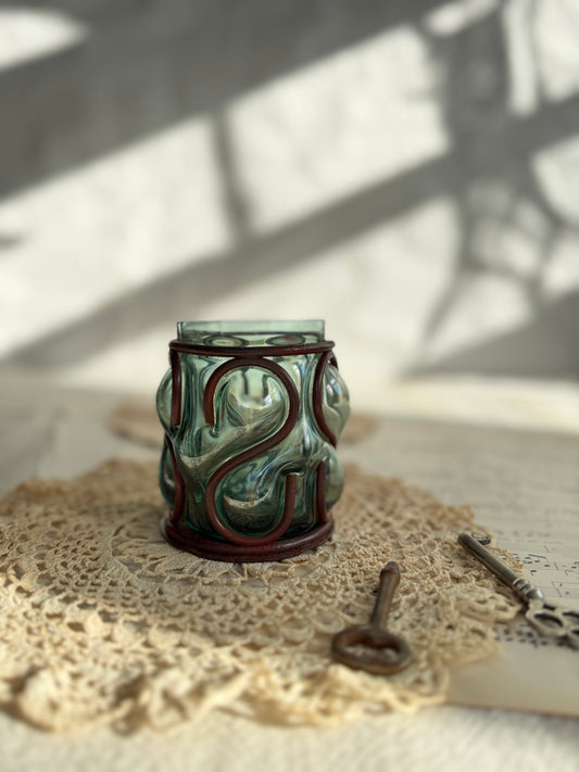 Caged glass candle holder