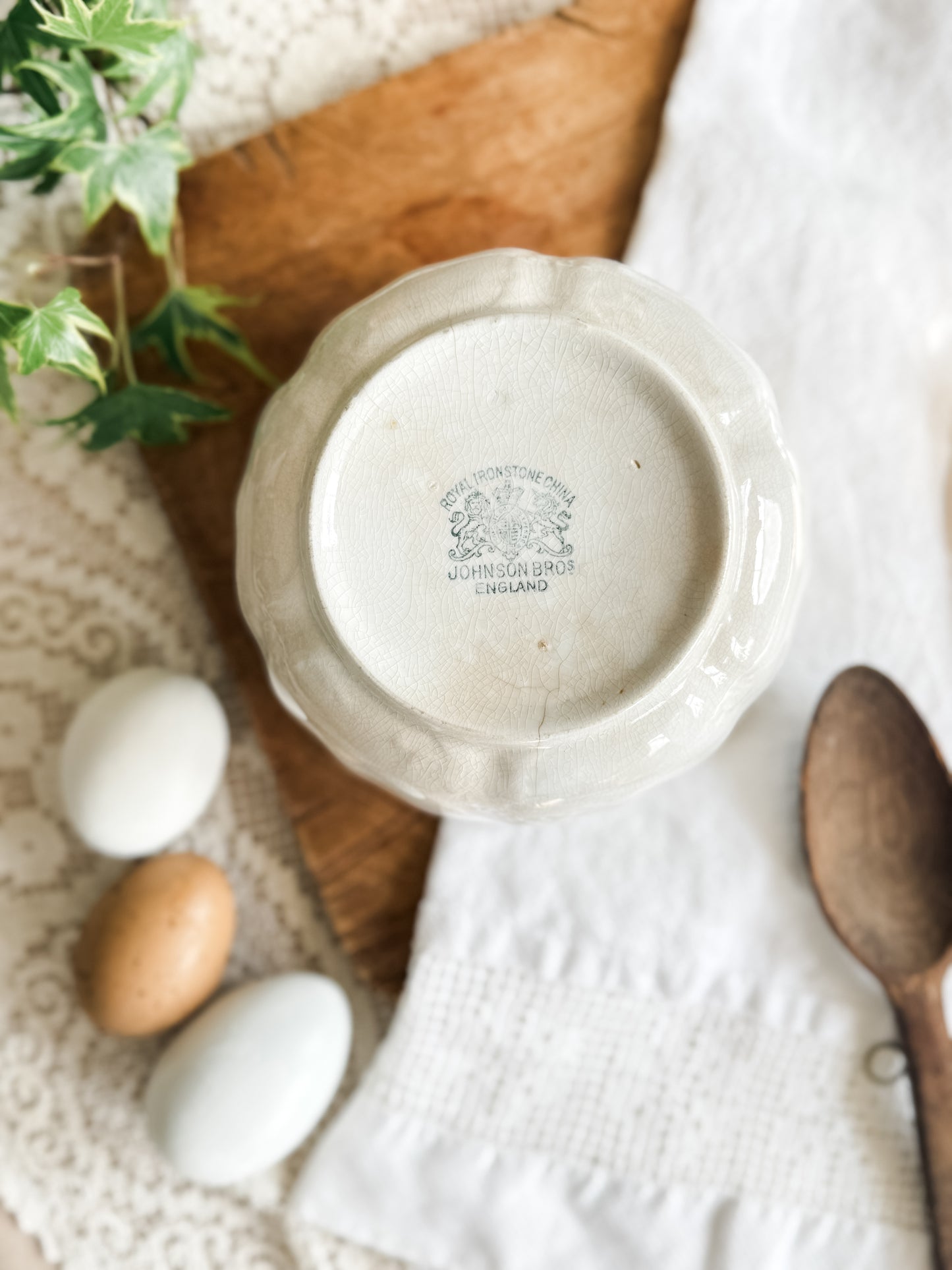 Small stained and crazed antique ironstone bowl