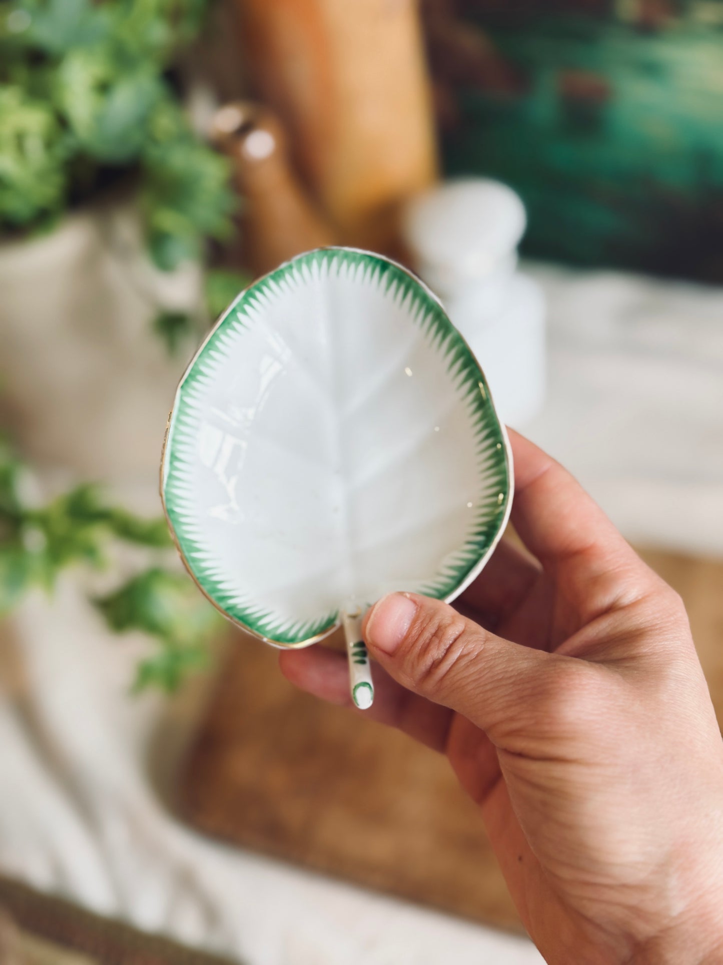 Small rare porcelain leaf dish with handle