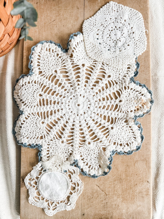 Set of 3 blue and white doilies