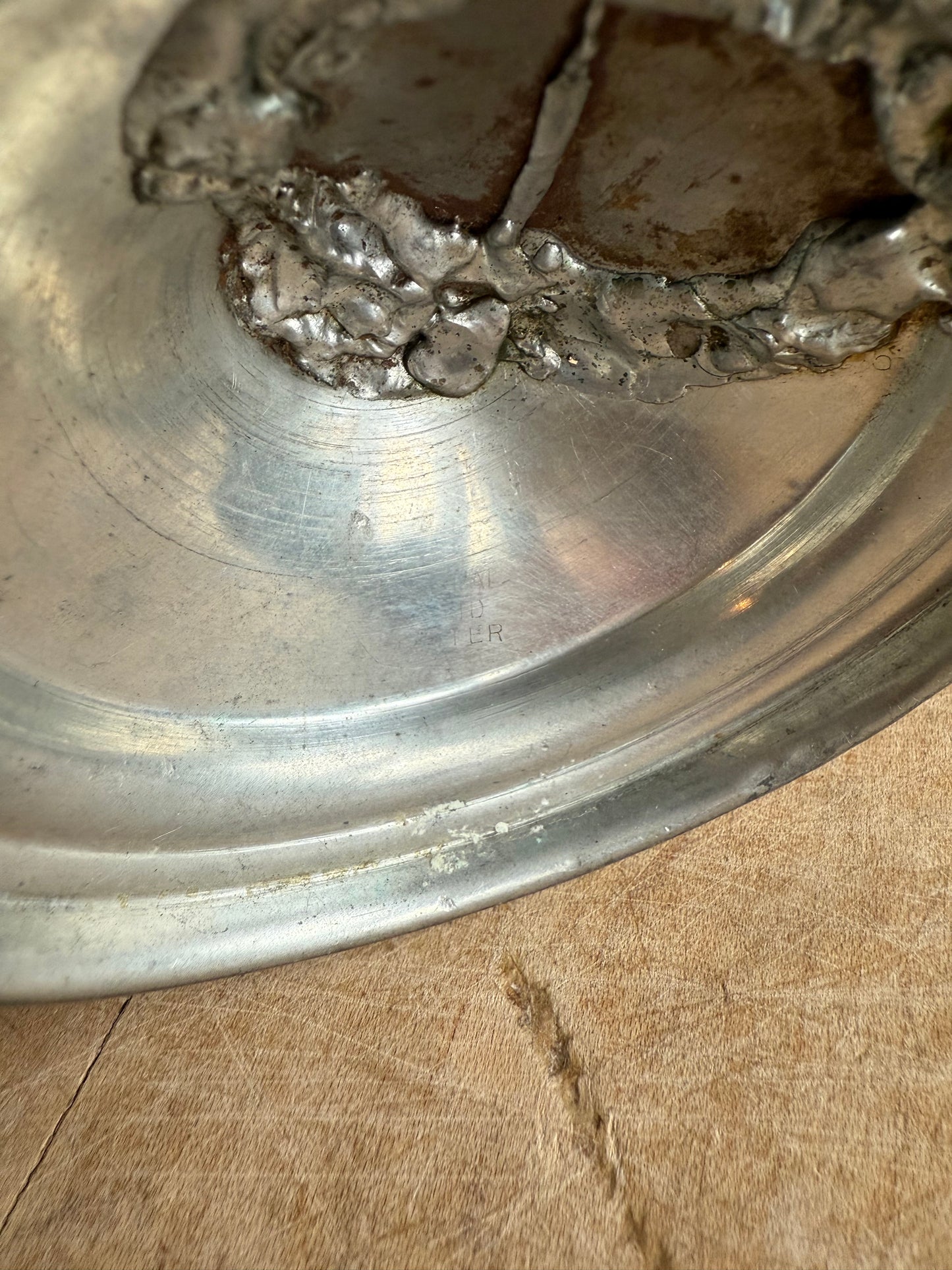 Pewter Cherub Holding a Flower Compote