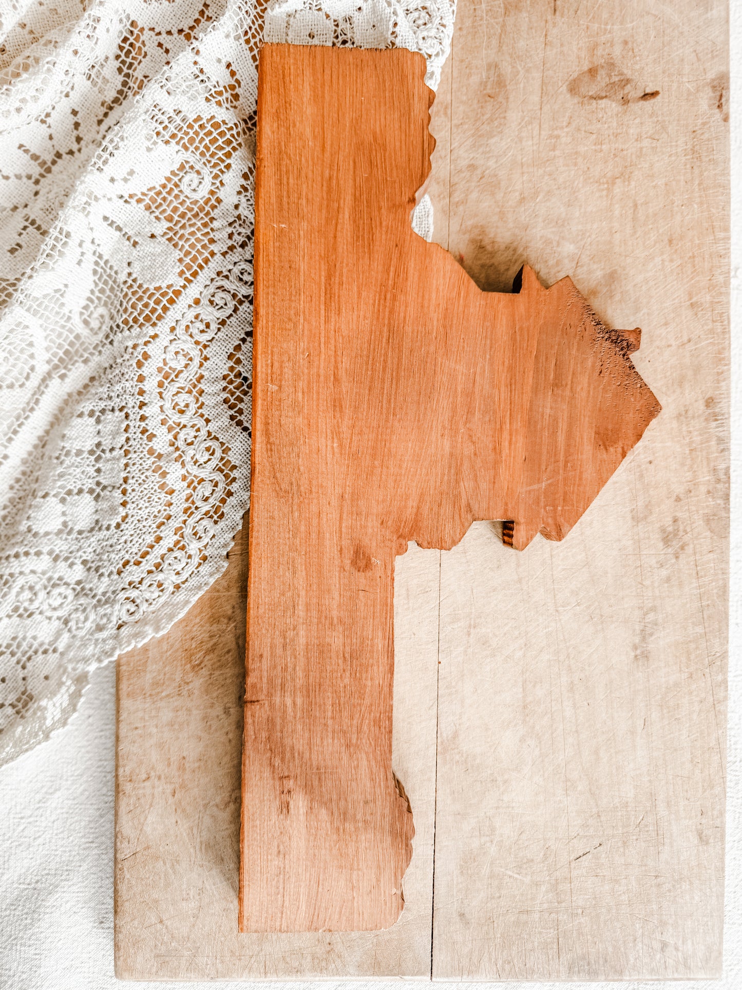 Wooden Farmhouse with hanging quilts on the line