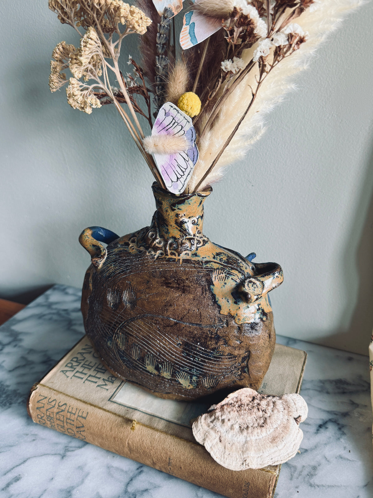 Studio pottery vase with handles