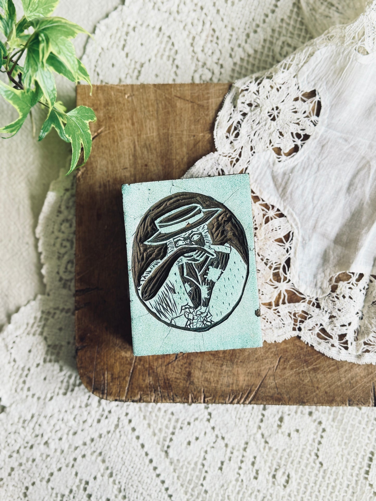 Vintage woodblock/linocut portrait of a woman in a hat