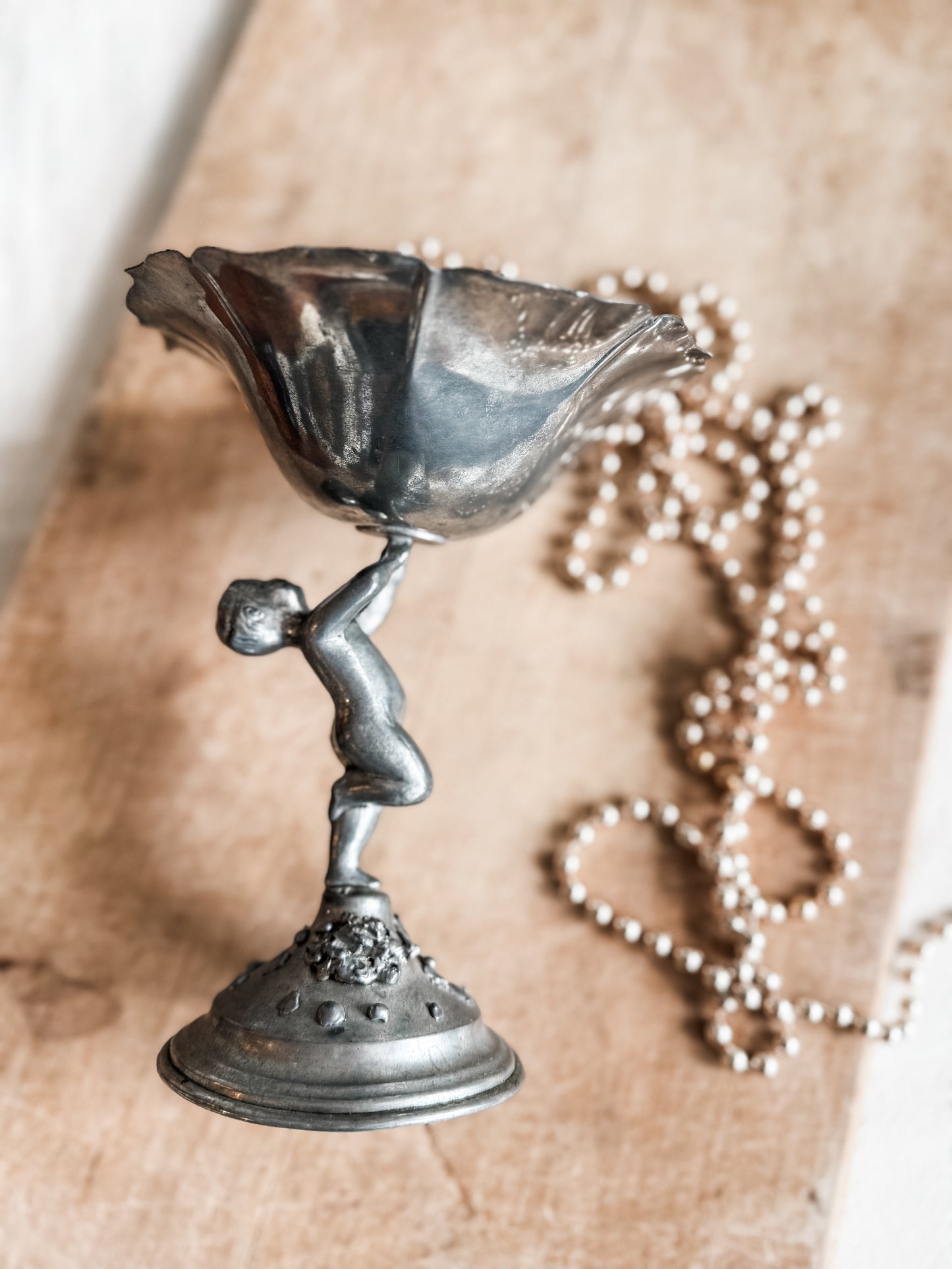 Pewter Cherub Holding a Flower Compote