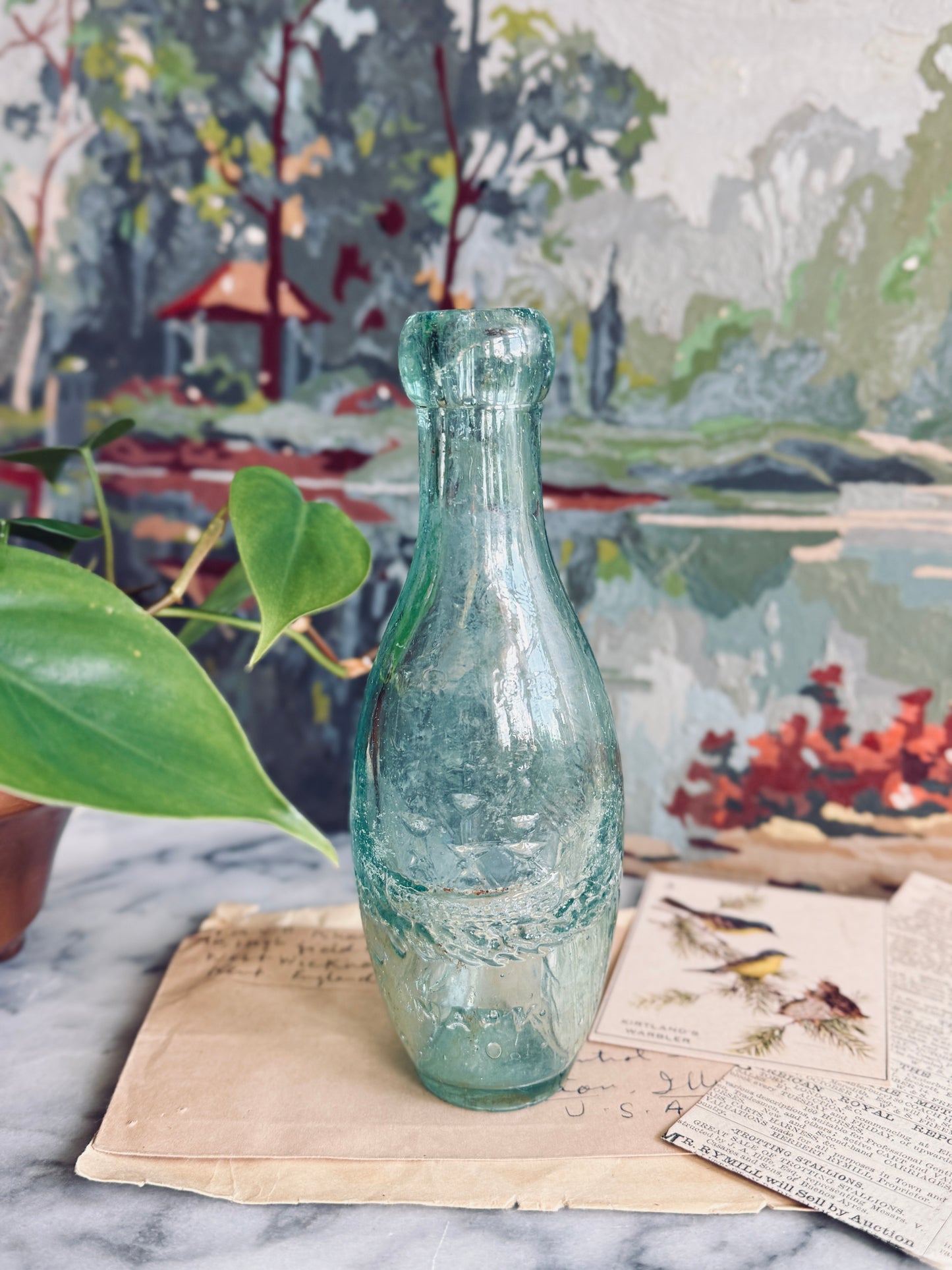 Antique aqua glass bottle