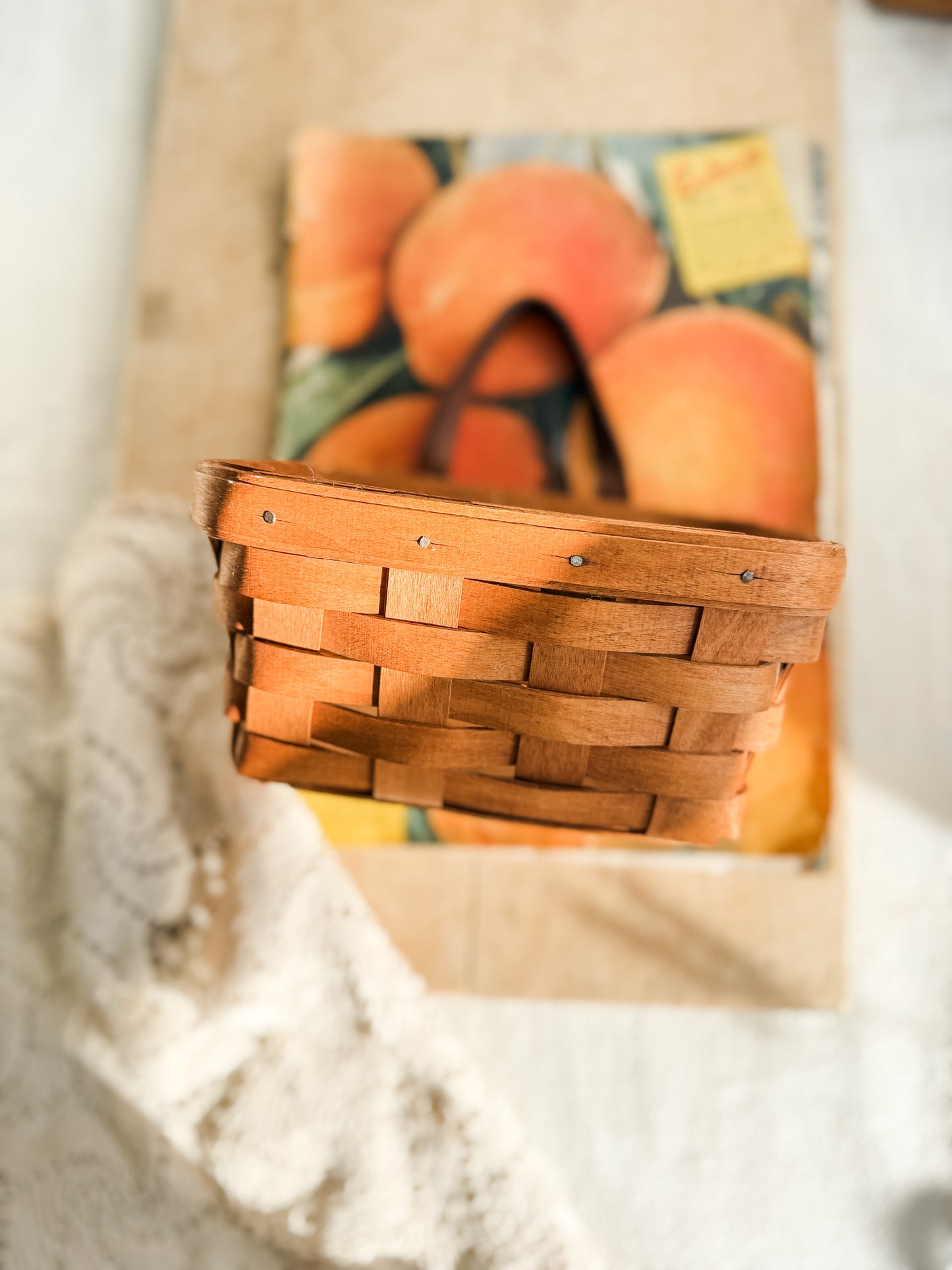 Small vintage Longaberger woven basket with leather handle and wall hanger