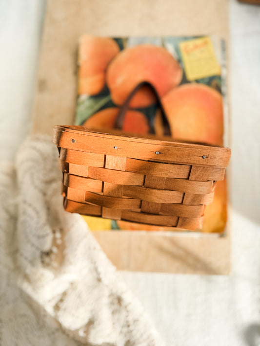 Small vintage Longaberger woven basket with leather handle and wall hanger