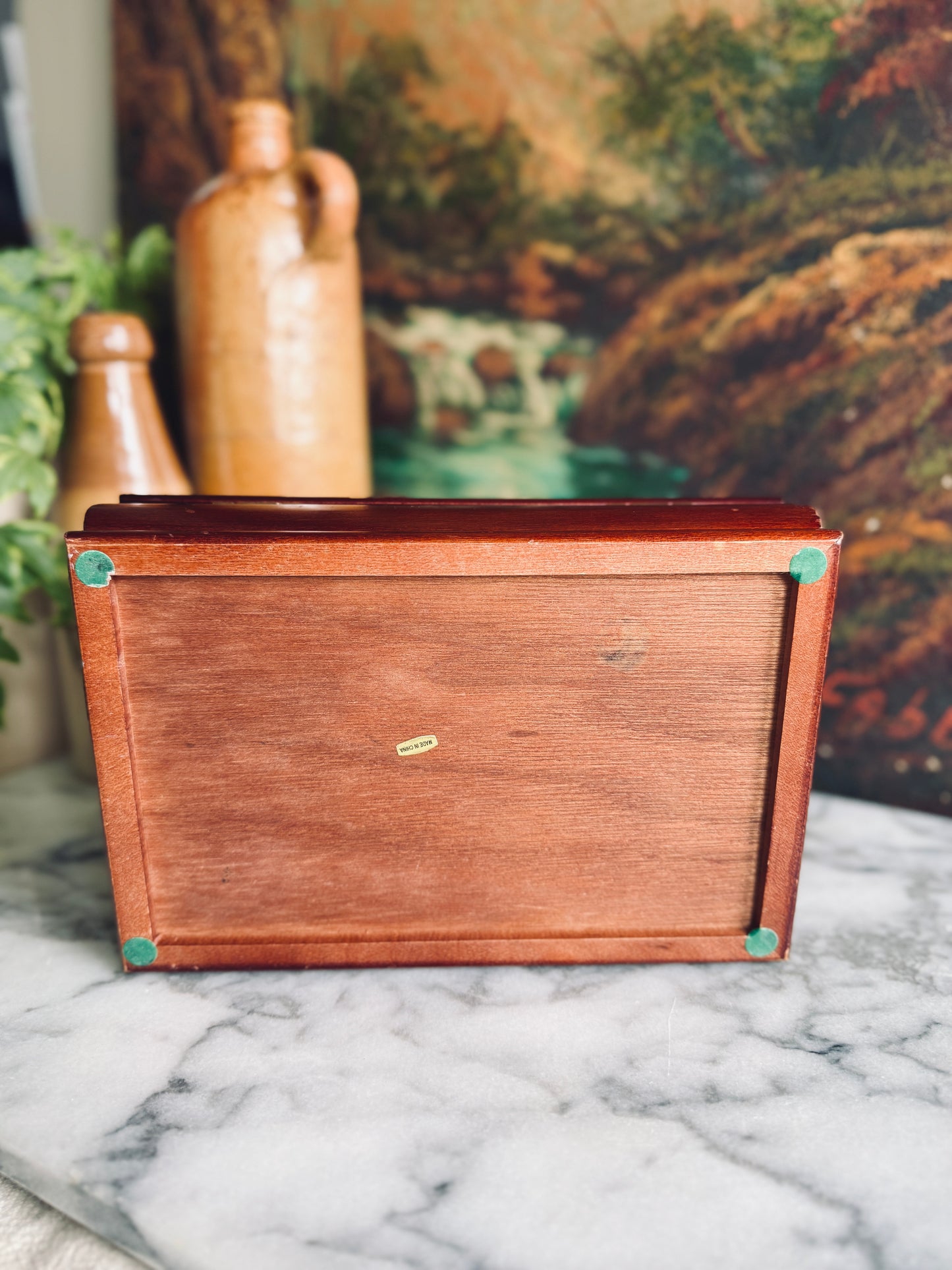 Wooden jewelry box with floral fabric inlay on lid