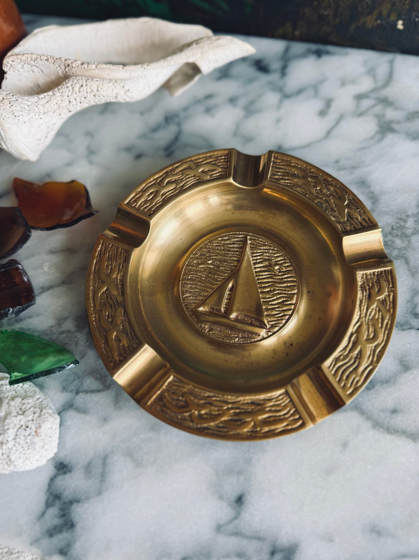 Brass ashtray with sailboat and seagulls