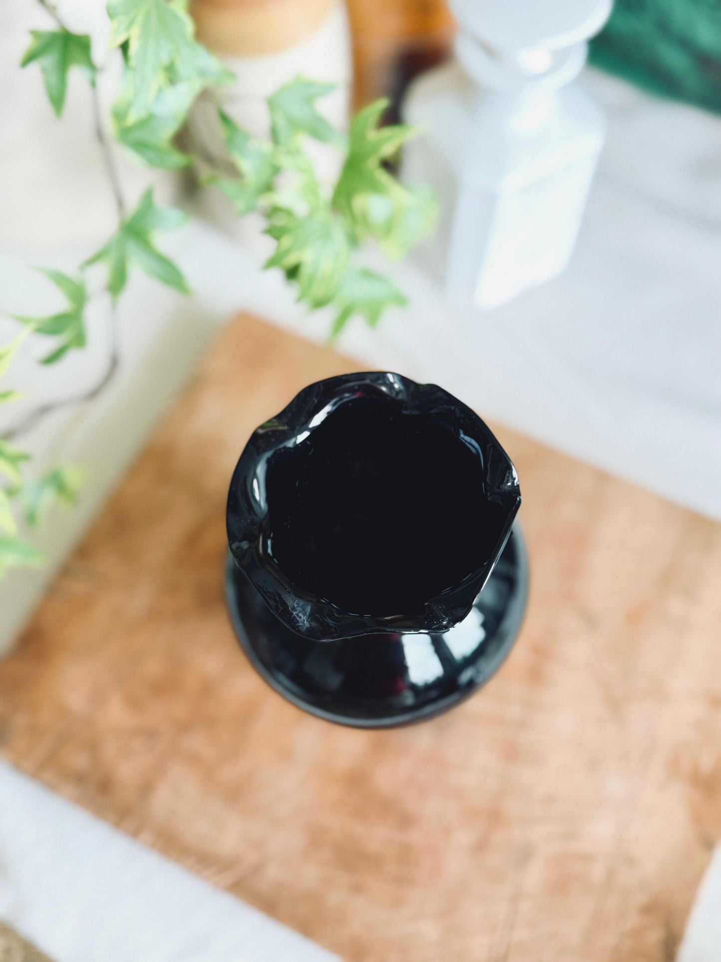 Vintage black amethyst ruffled vase with floral design