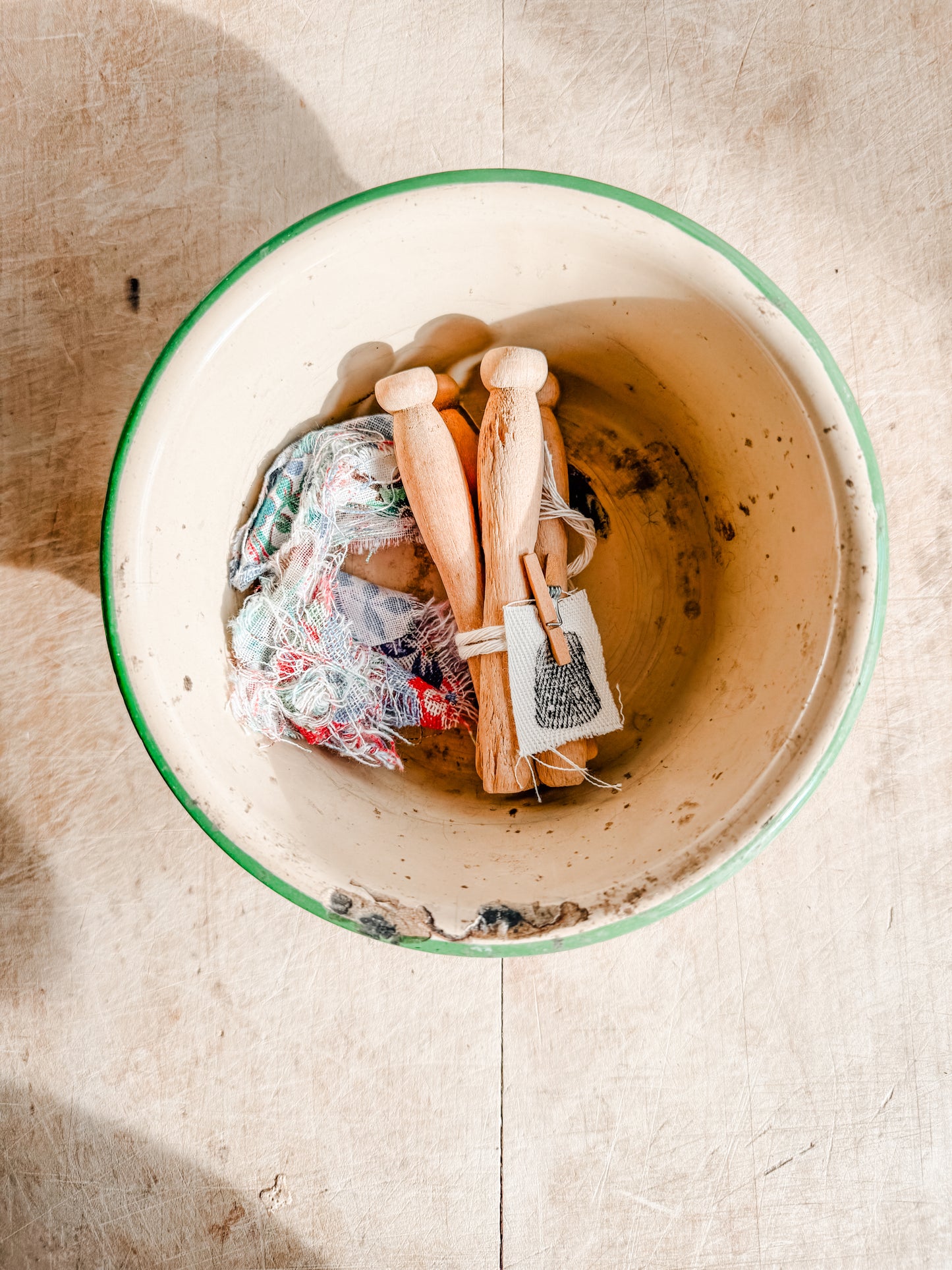 Small Green Rimmed Tan Chippy and Rusty Enamelware dish