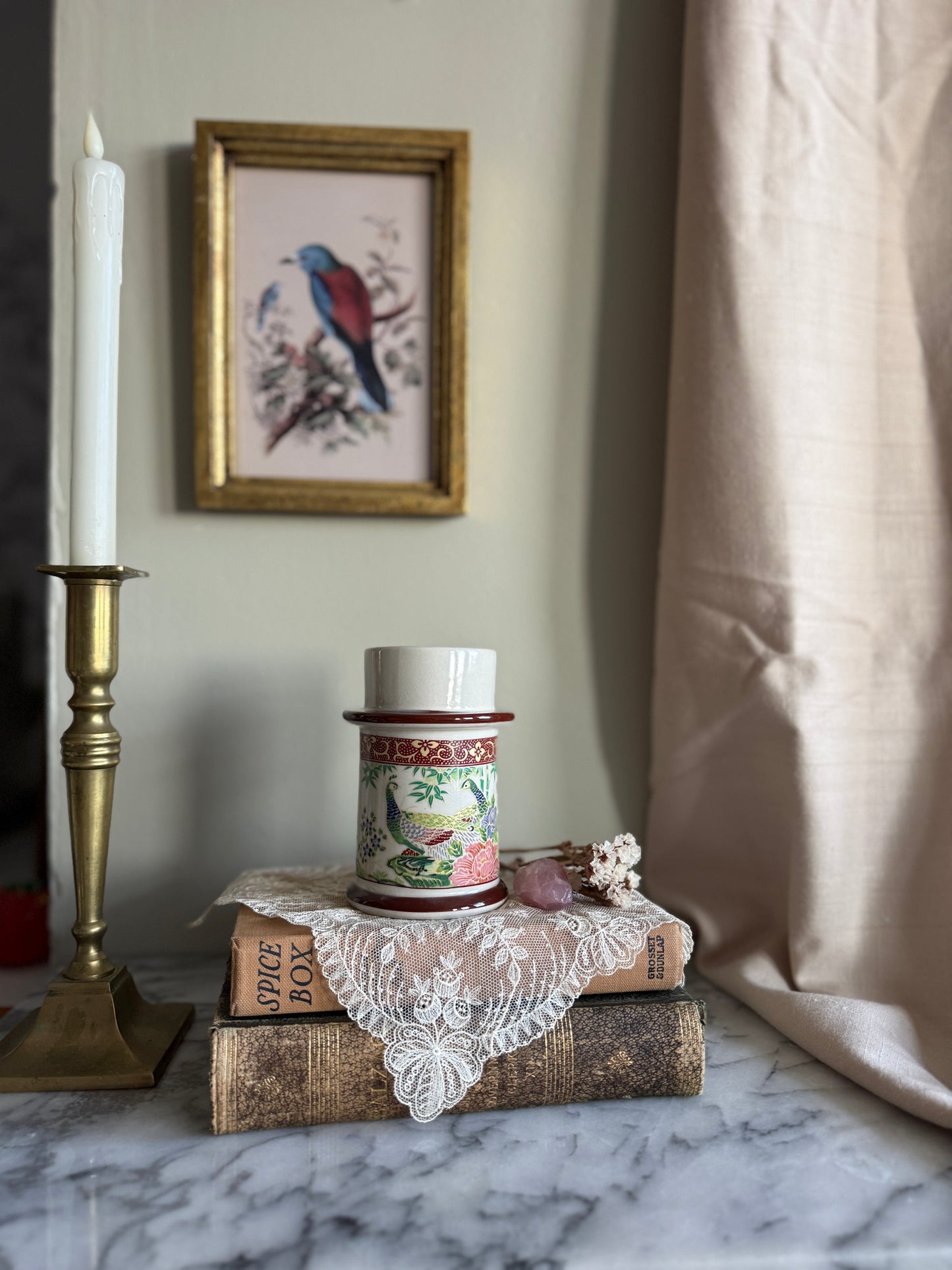 Porcelain candle holder with peacock
