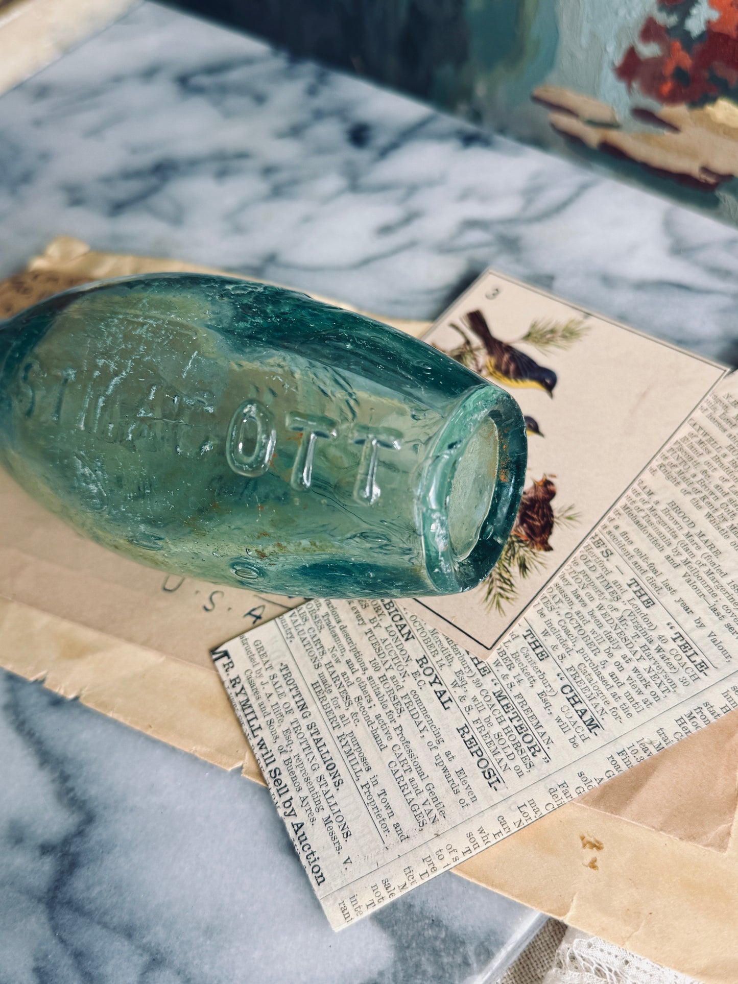 Antique aqua glass bottle