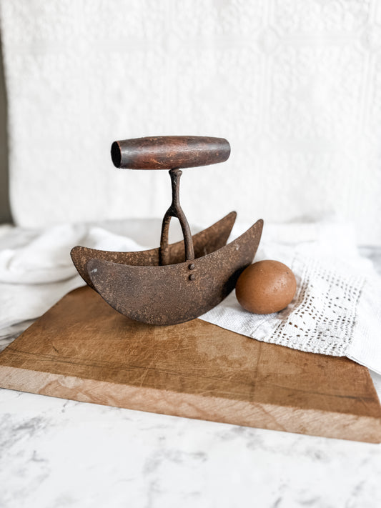 Primitive food chopper with wooden handle
