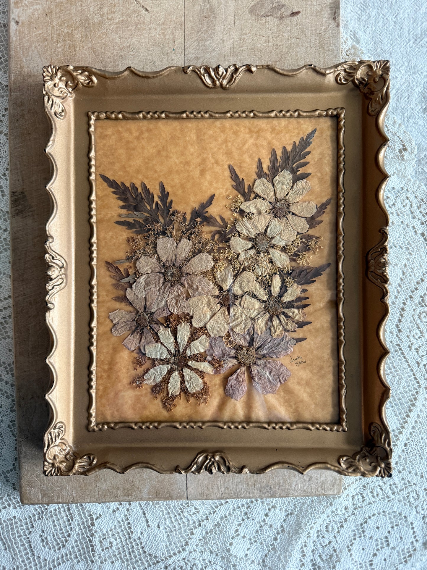 Large gold framed dried florals