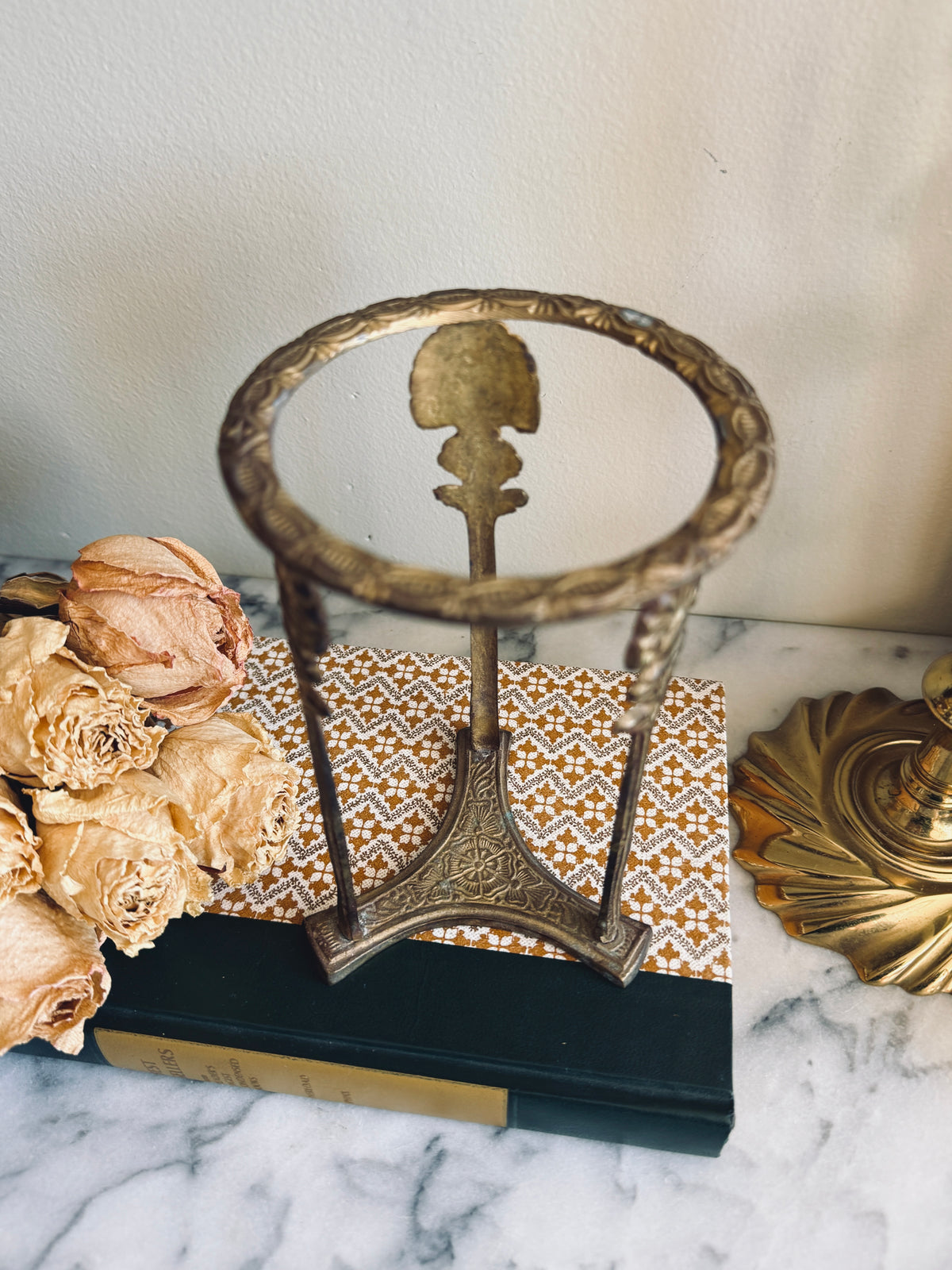 Crackle glass vase in Hollywood regency style brass holder