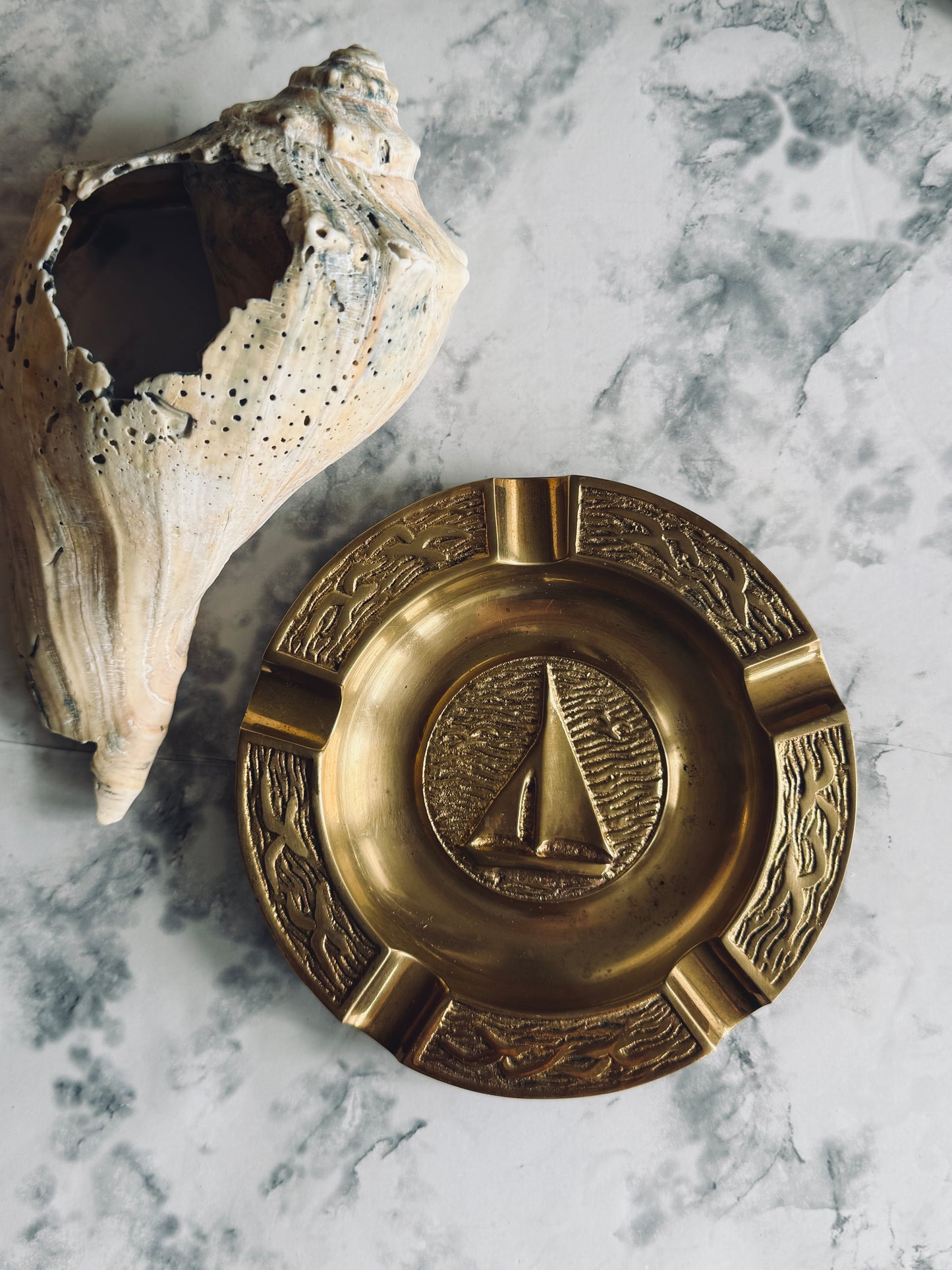 Brass ashtray with sailboat and seagulls
