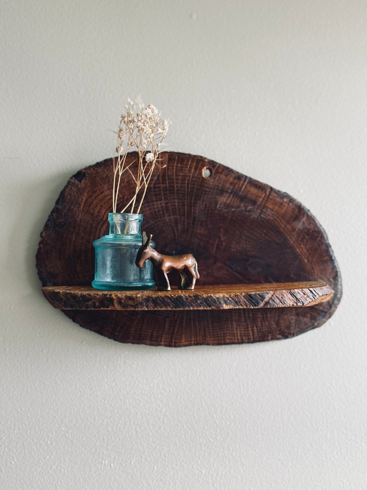 Small rustic wood slice shelf