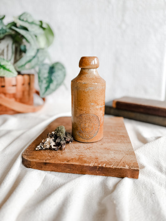 Antique stoneware bottle with round rim. Antique era, 1890-1920 Marked John Gundy, Stockport