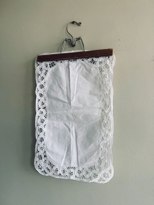 White vintage linen with lace border