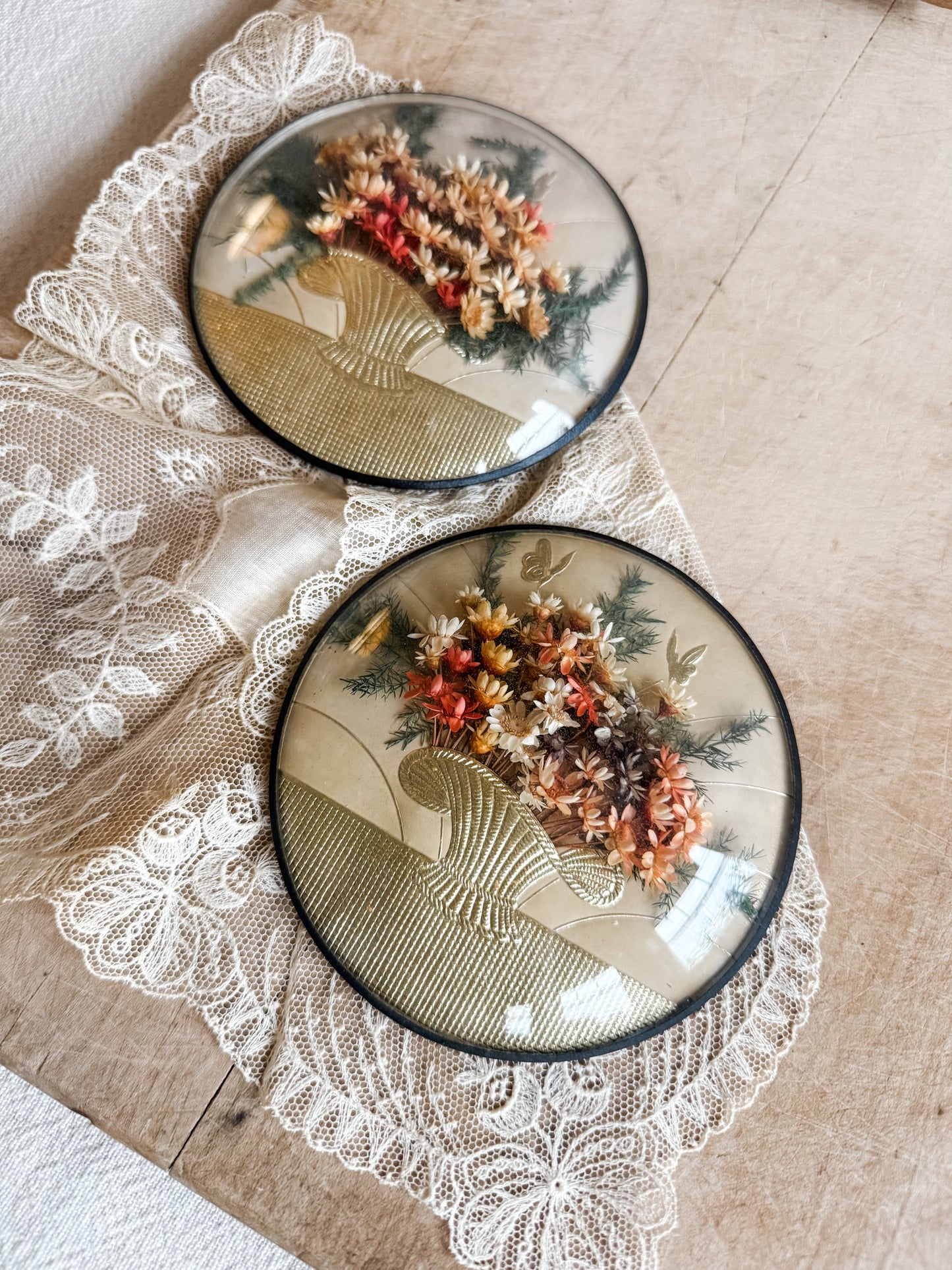 Pair of Vintage Dried Florals in a Round Convex Frame