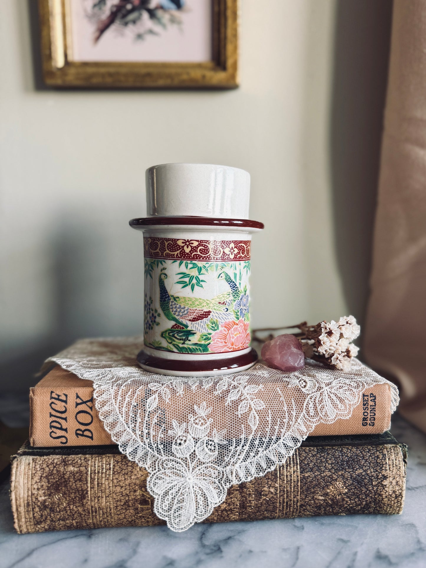 Porcelain candle holder with peacock