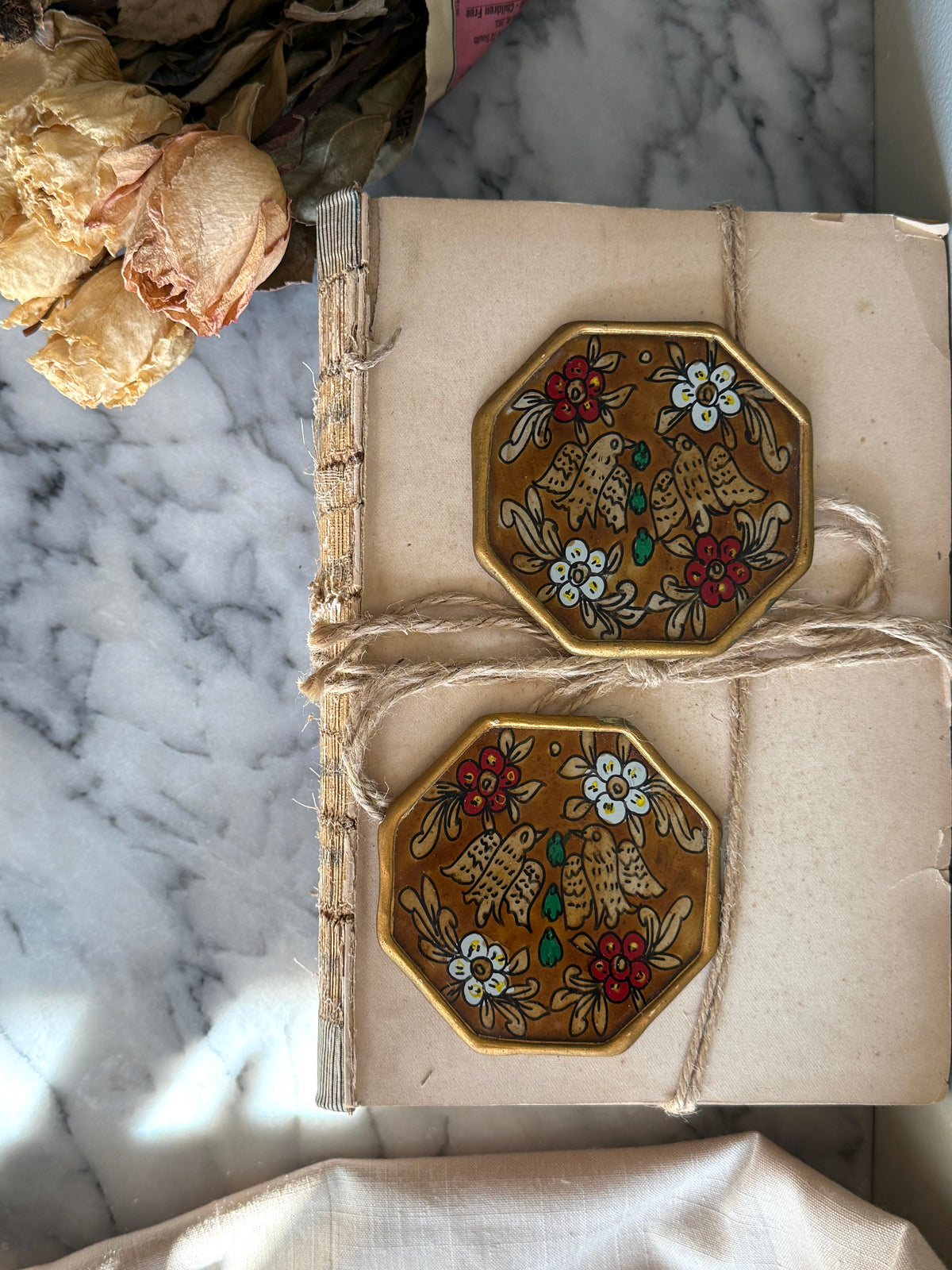Pair of reverse painted coasters