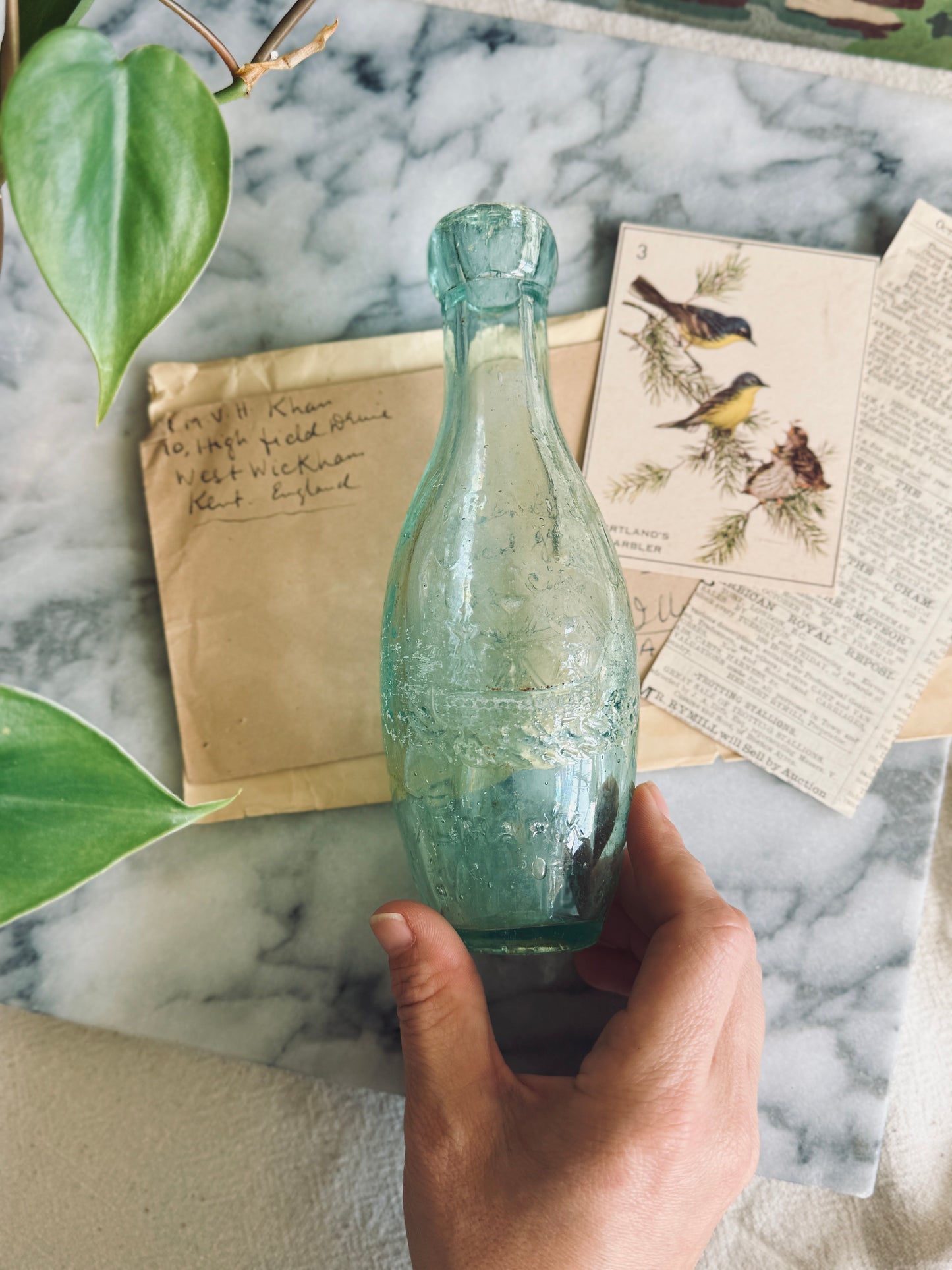 Antique aqua glass bottle