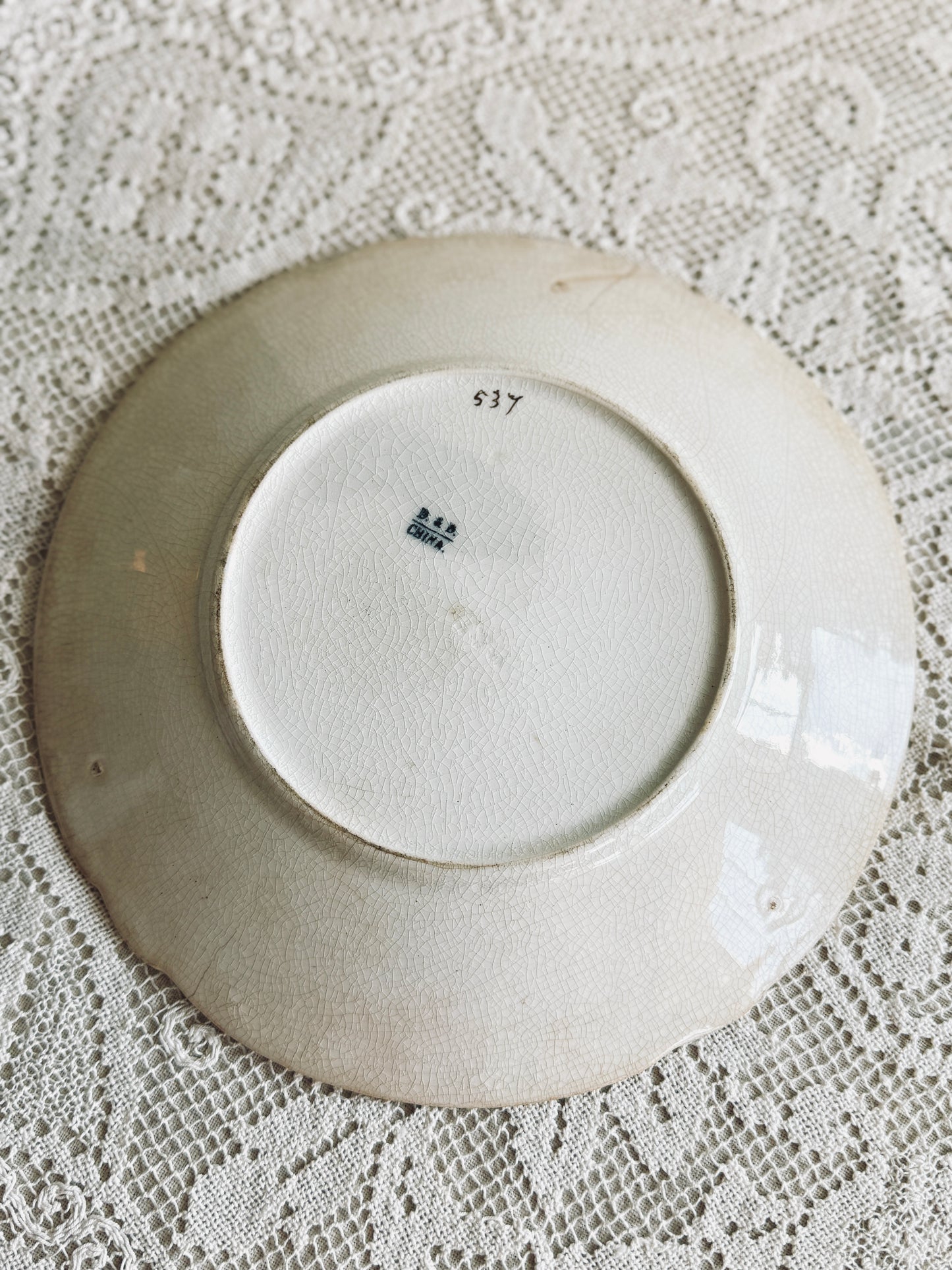 Floral stained and crazed plate