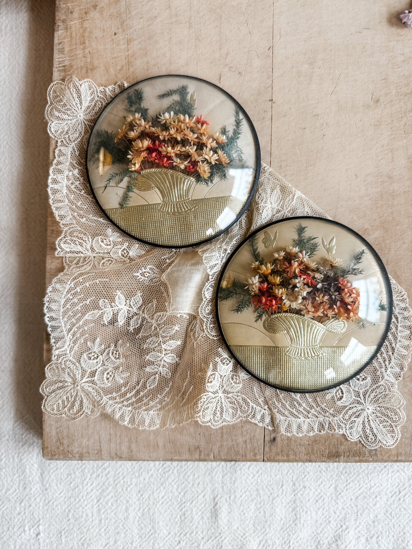 Pair of Vintage Dried Florals in a Round Convex Frame