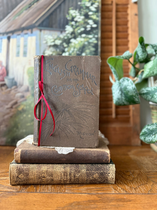 English grammar brown book with floral detail