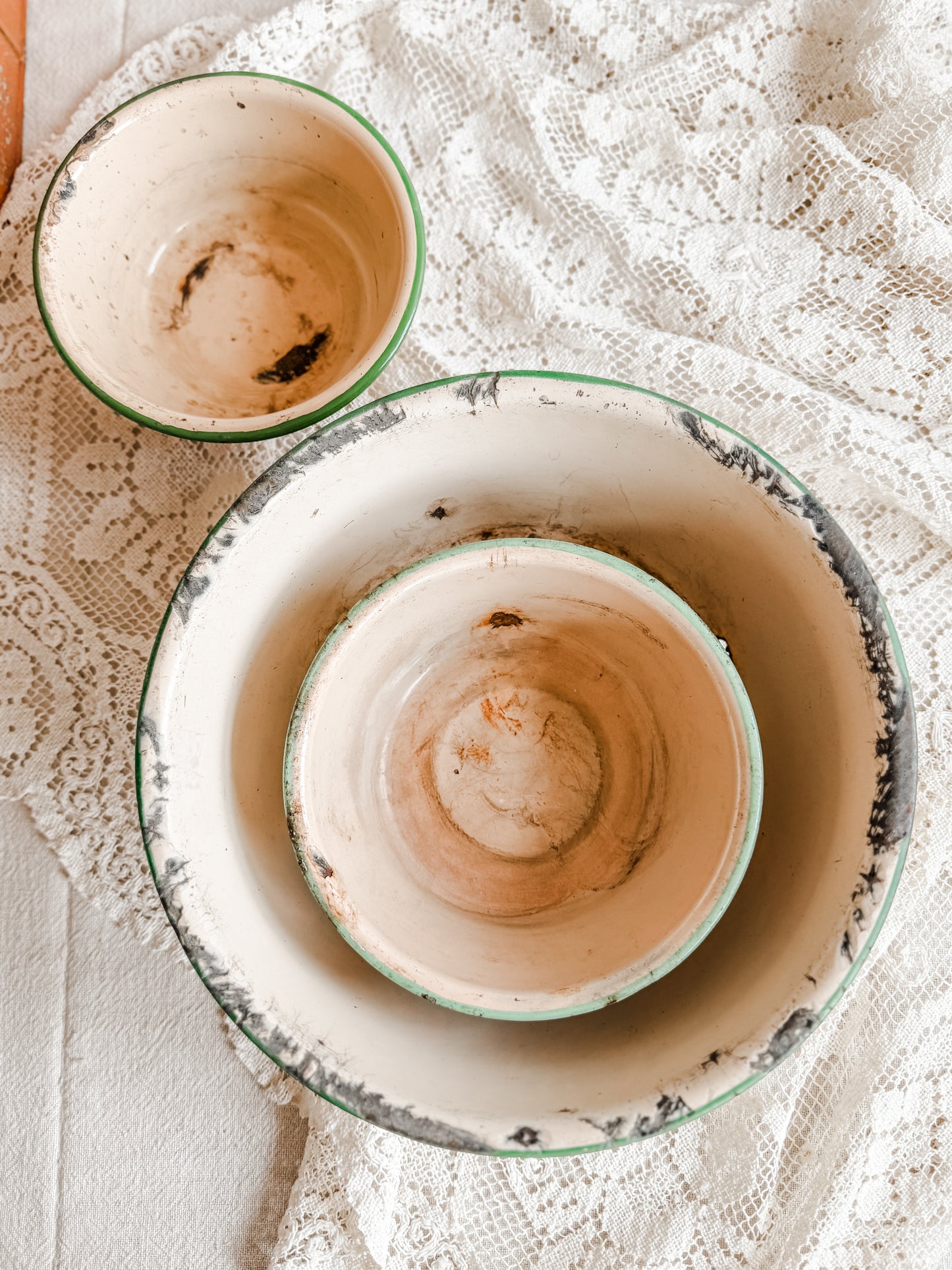Small Green Rimmed Tan Chippy and Rusty Enamelware dish