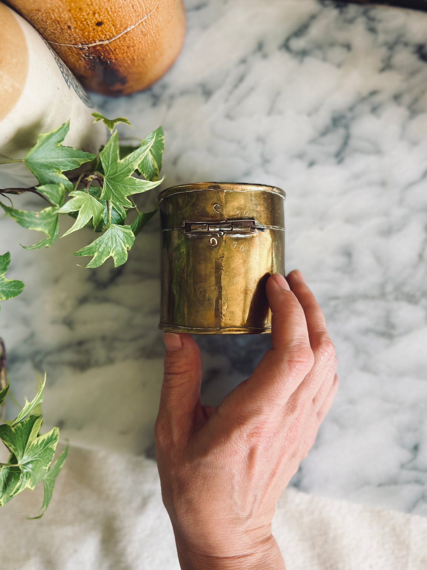 Small lidded brass canister