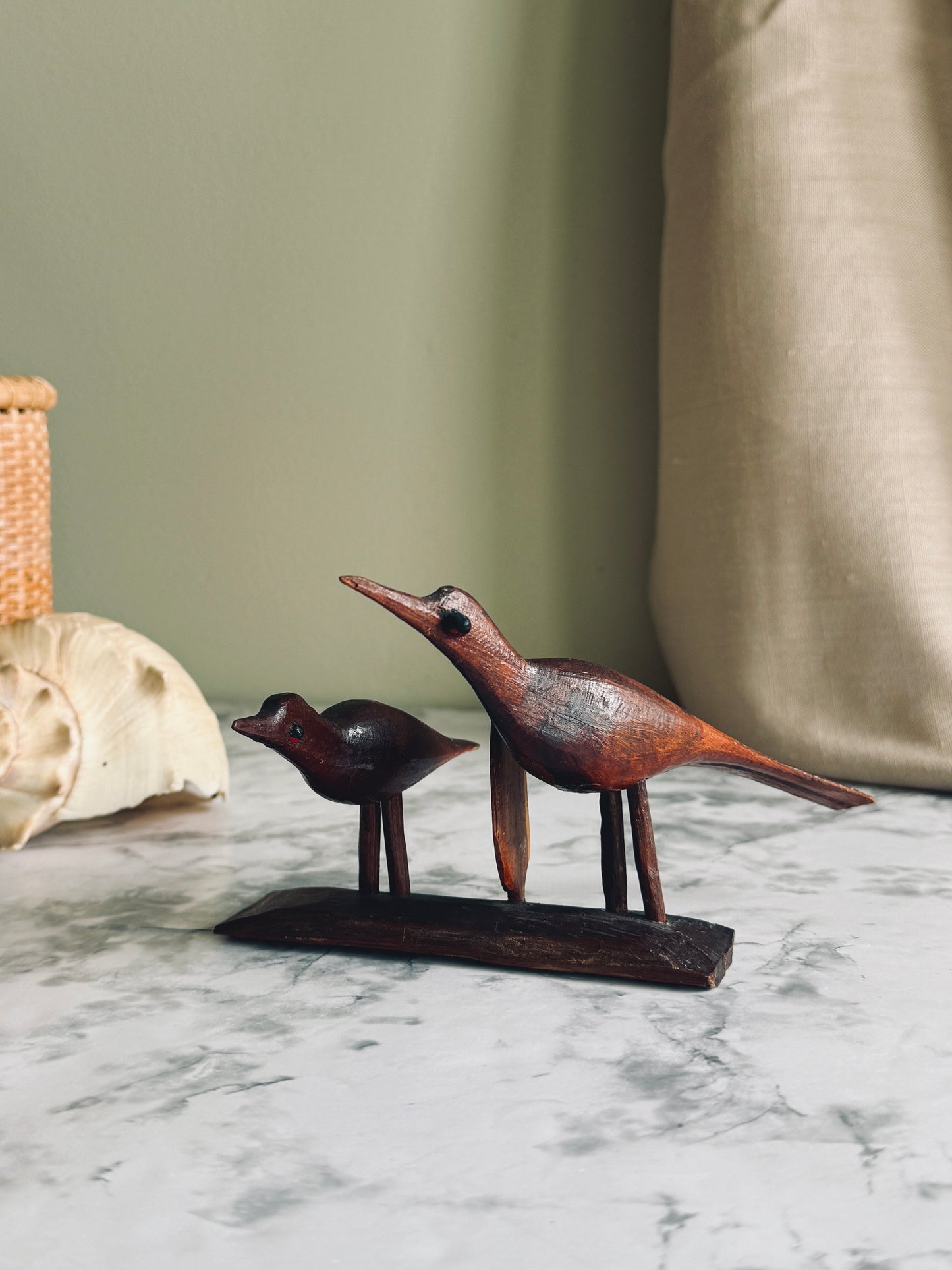 Handcarved wooden birds