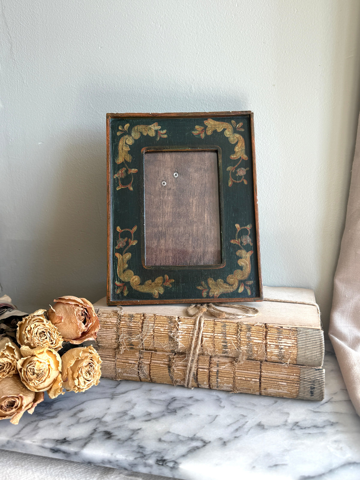 Handmade wooden frame with painted details