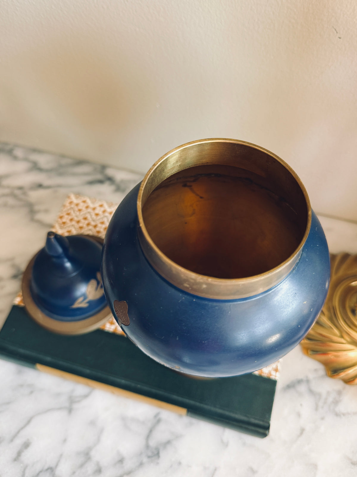 Brass and navy blue enameled urn
