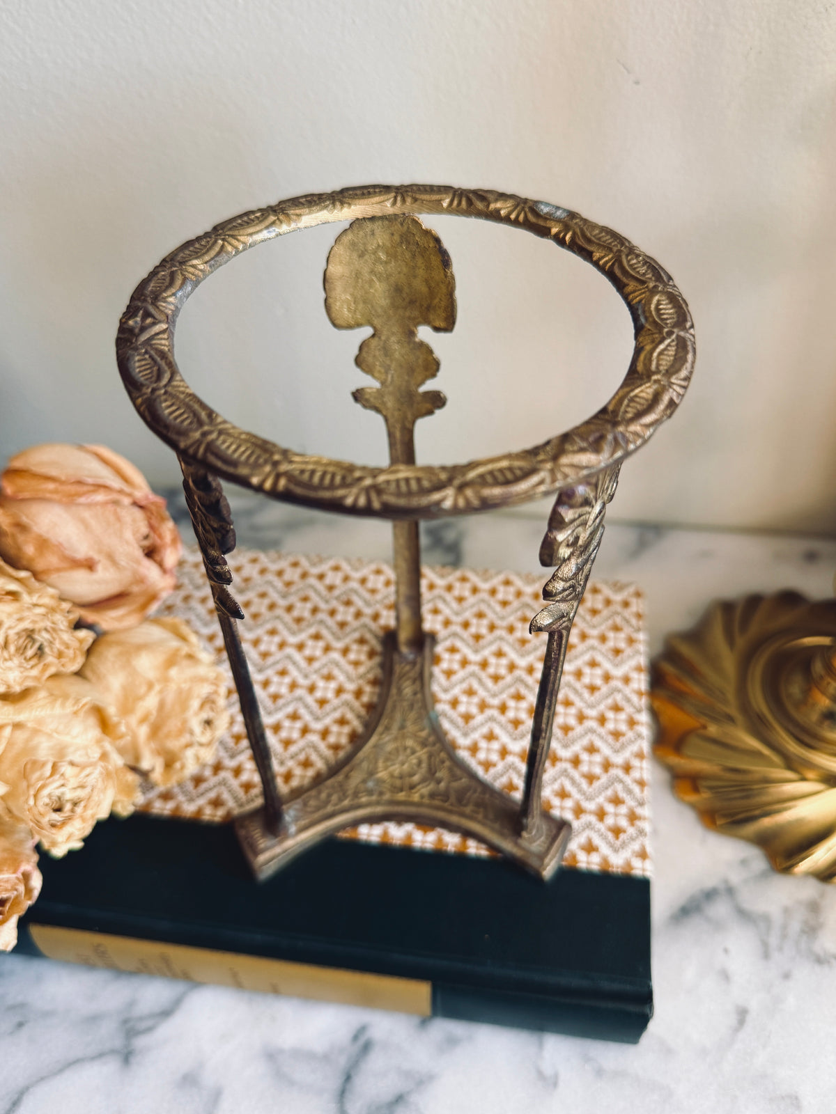 Crackle glass vase in Hollywood regency style brass holder