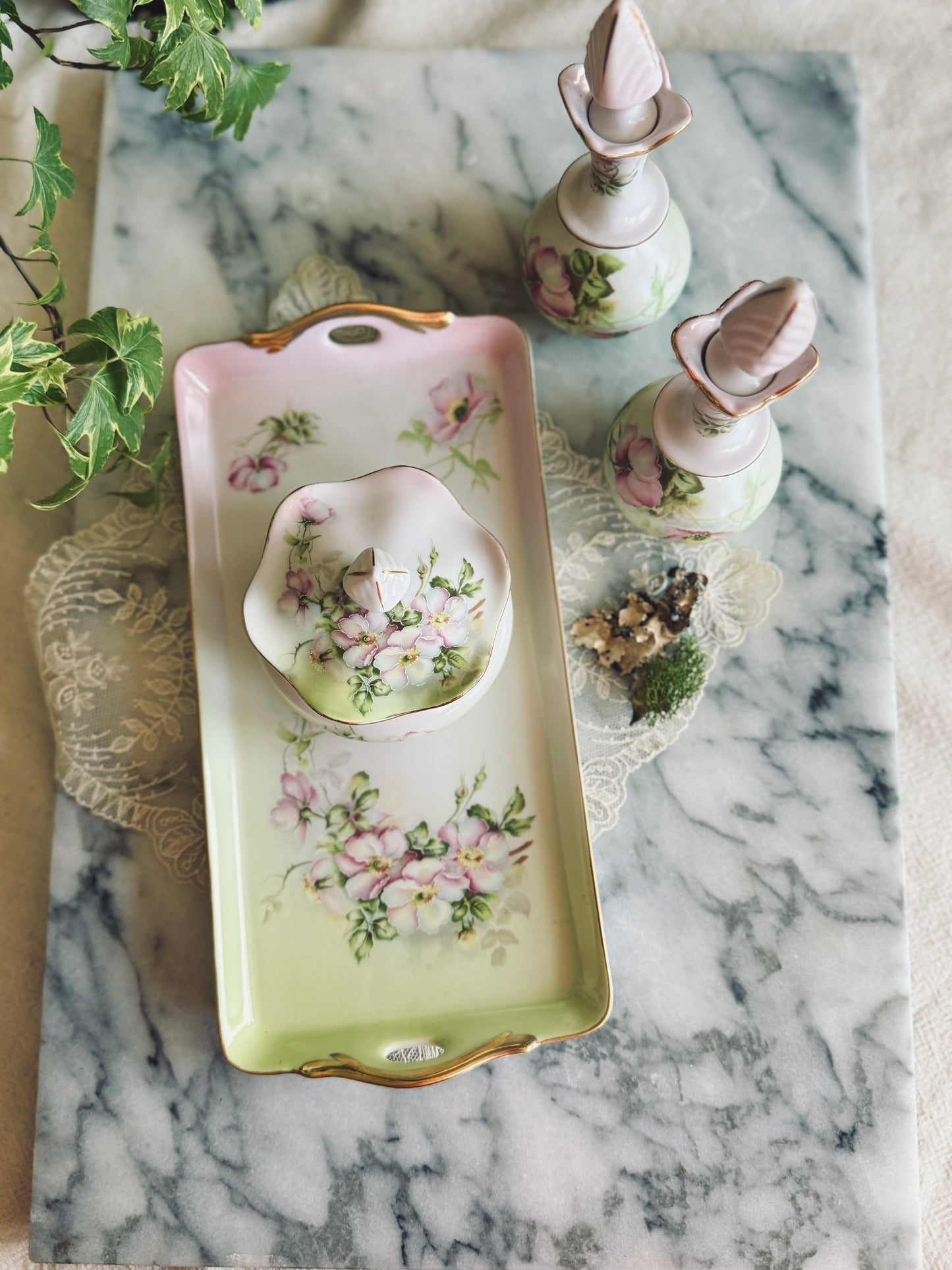 Four piece hand painted Nippon vanity set
