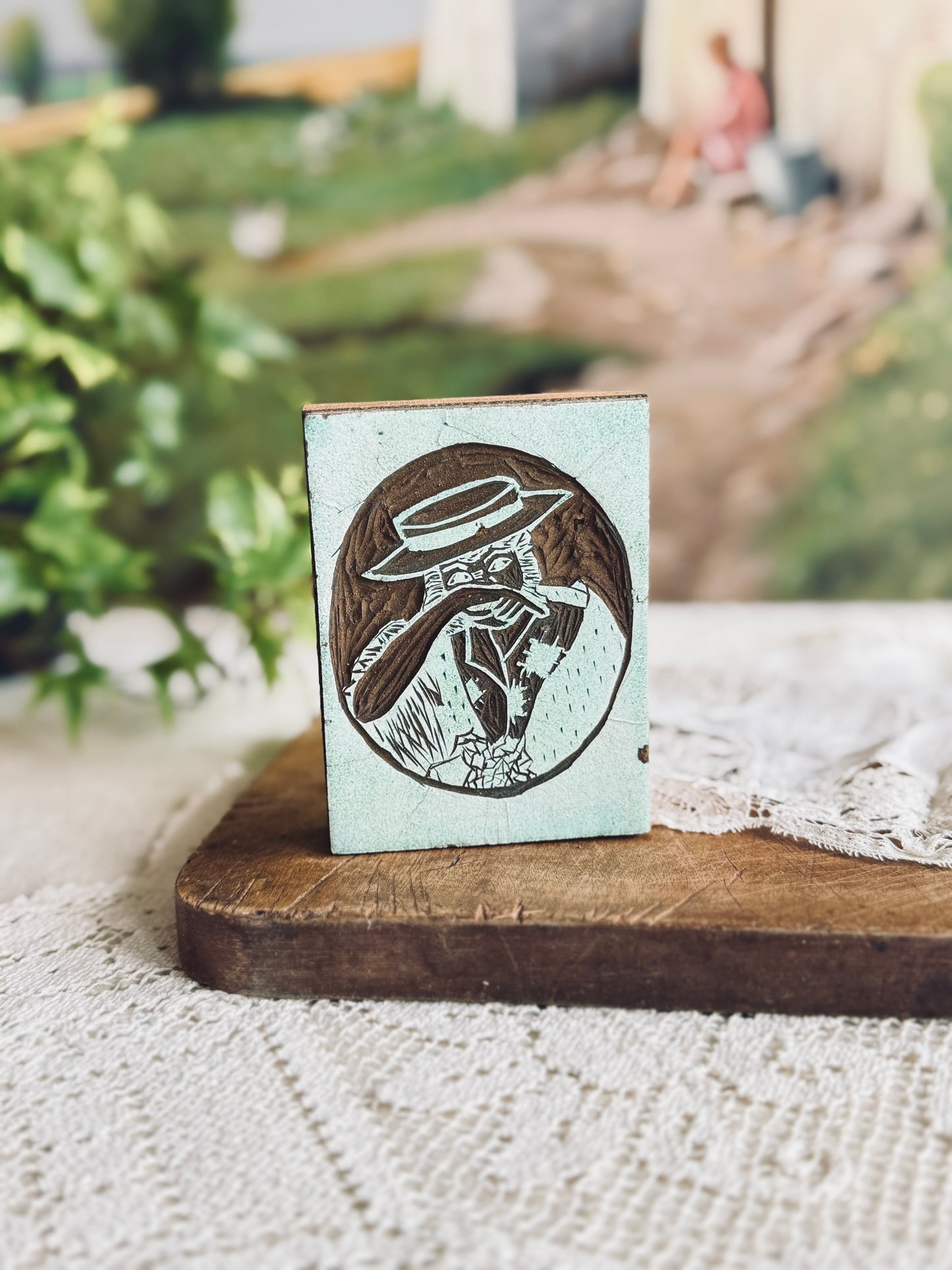 Vintage woodblock/linocut portrait of a woman in a hat