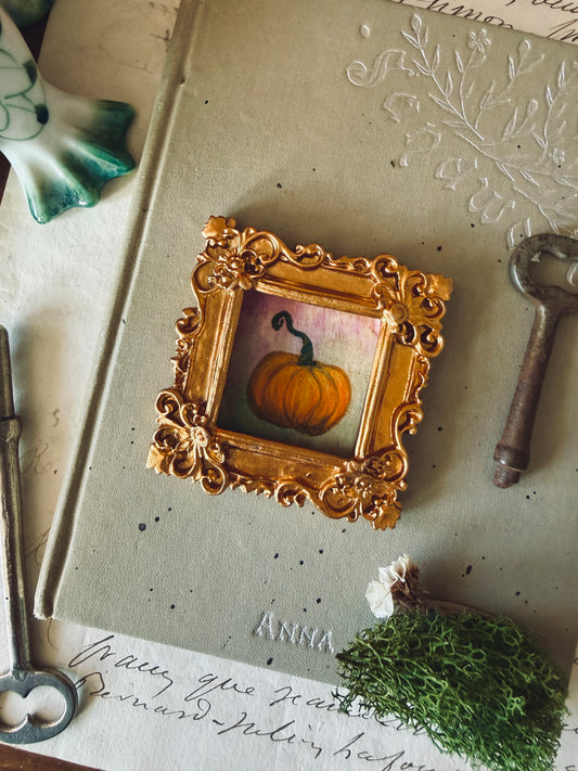 Mini pumpkin portrait in square gold resin frame