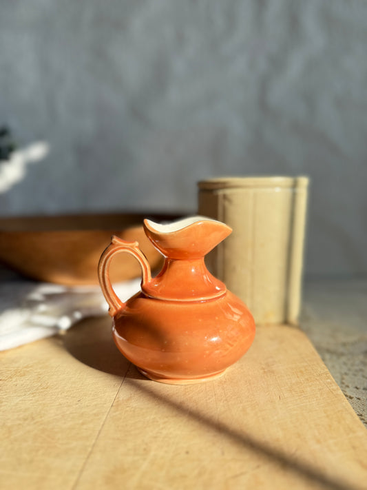Small orange Italian pitcher
